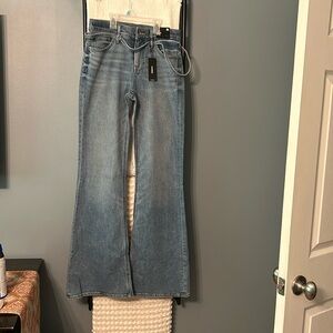 Seventies flare / wide leg Jean mid rise light denim